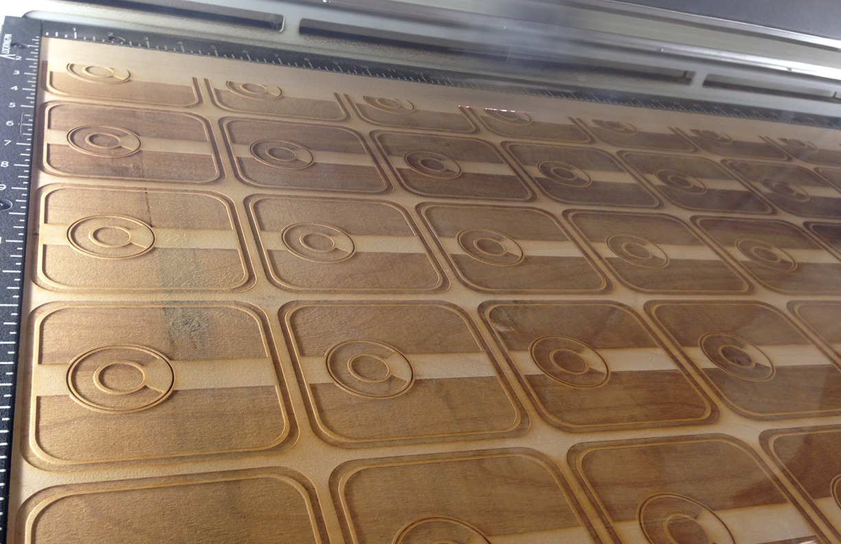 Colorado flag coasters — laser etching in progress